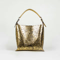 HOBO ORO AMARILLO