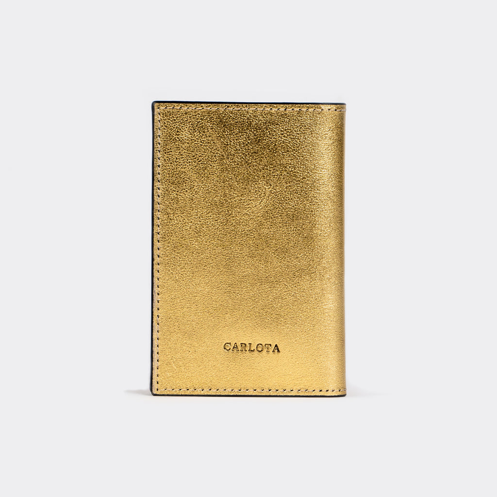 PORTA PASAPORTE SOL ORO