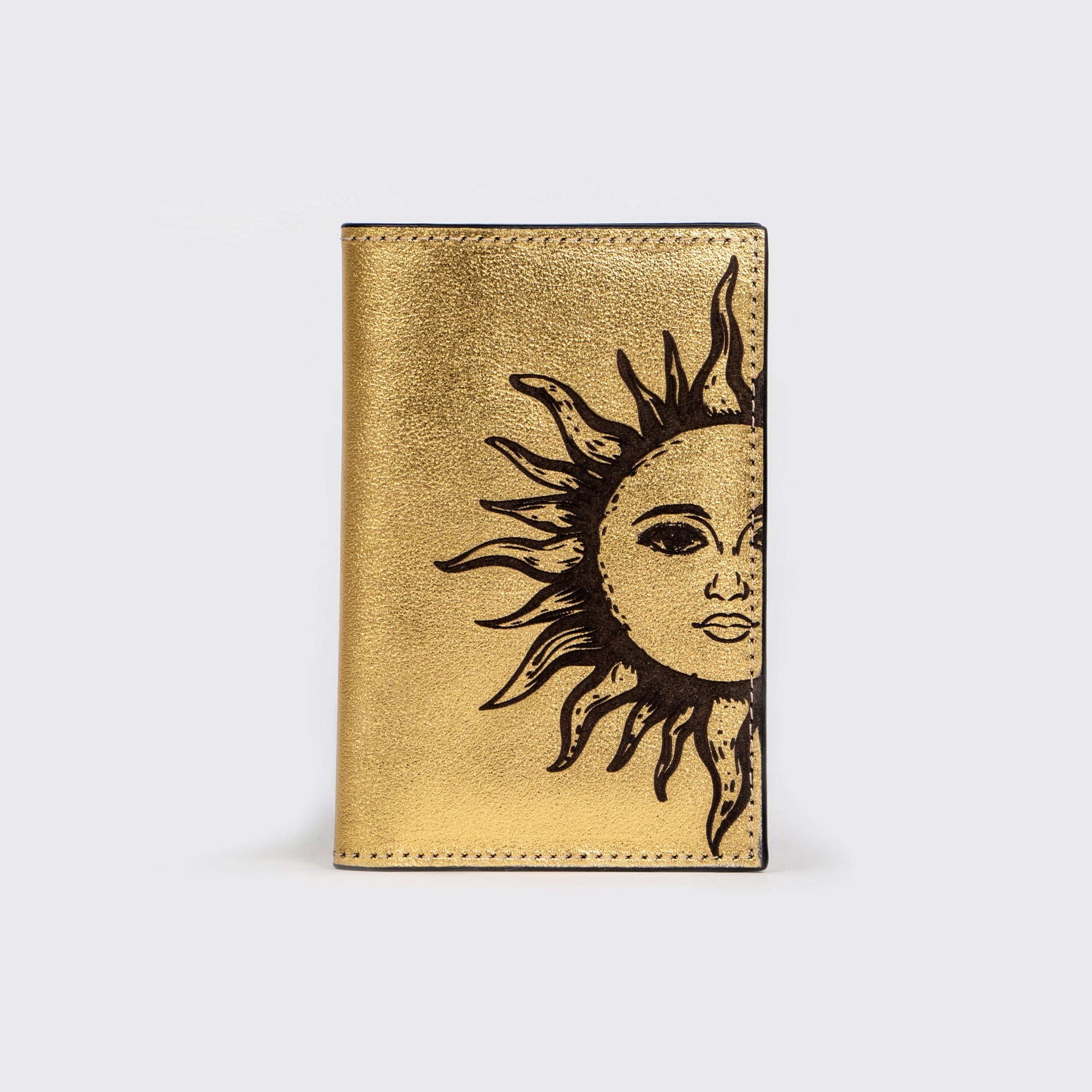 PORTA PASAPORTE SOL ORO